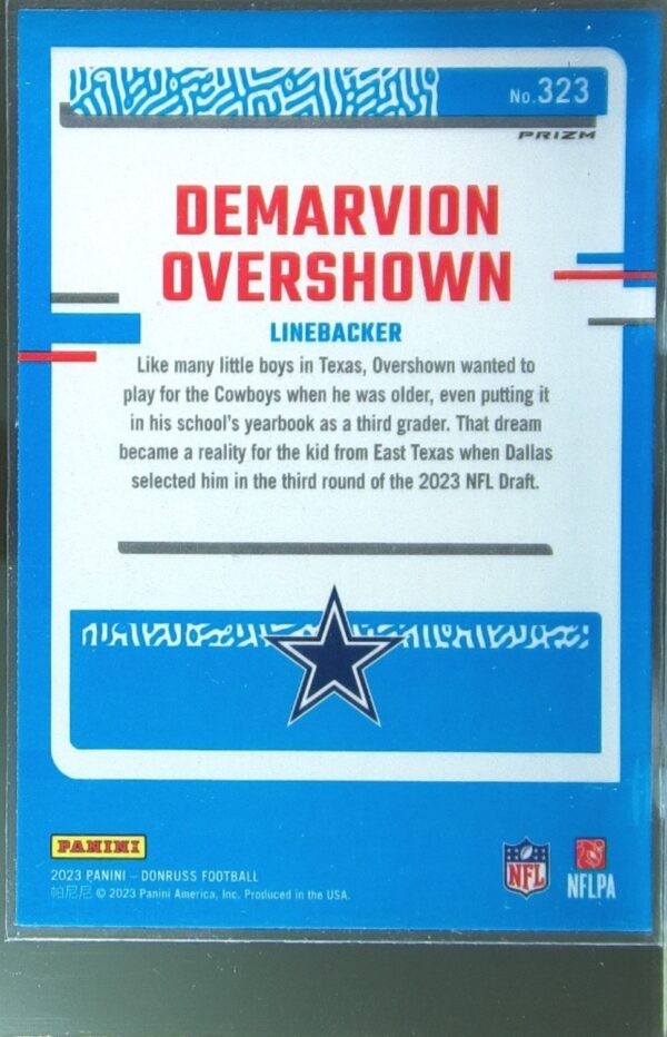 2023 Donruss Demarvion Overshown RC #323 Cowboys Optic Rated Rookie Red & Green - Image 3