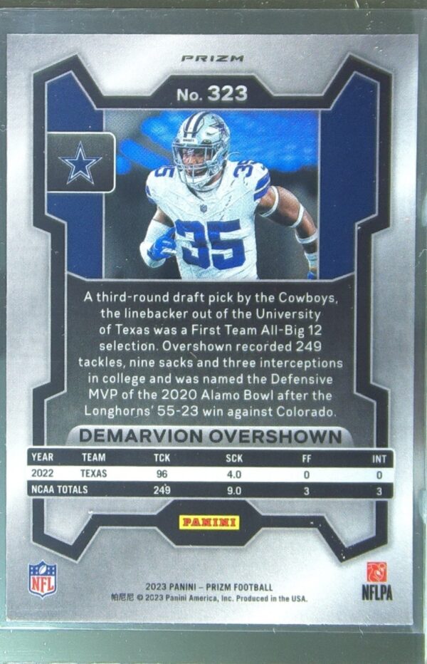2023 Prizm Demarvion Overshown Silver RC #323 Cowboys - Image 3