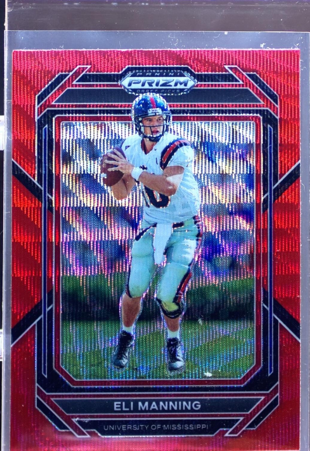 2023 Prizm Draft Picks Eli Manning Prizms Ruby Wave #37 Rebels