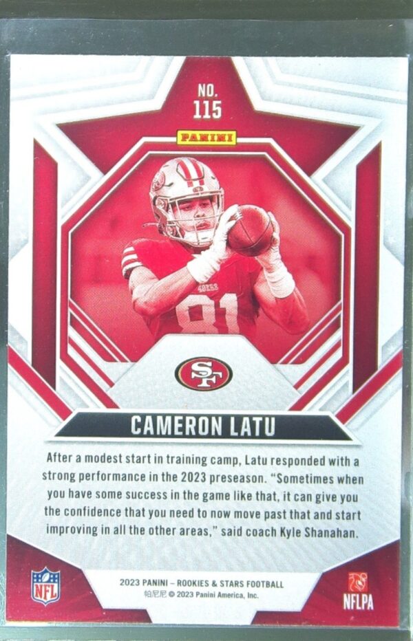 2023 Panini Rookies & Stars Cameron Latu Red RC #115 49ers - Image 3